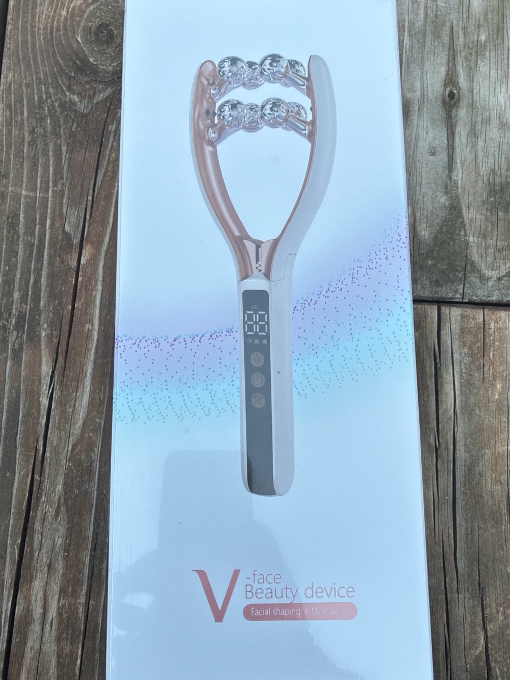 V-face Beauty Device - Rose Gold & White Facial Sculpting Tool